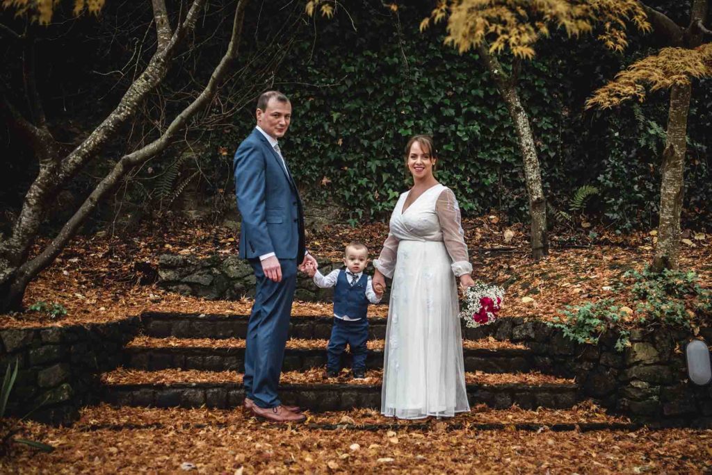 Happy couple sharing a quiet moment as they walk down a scenic path in Tipperary