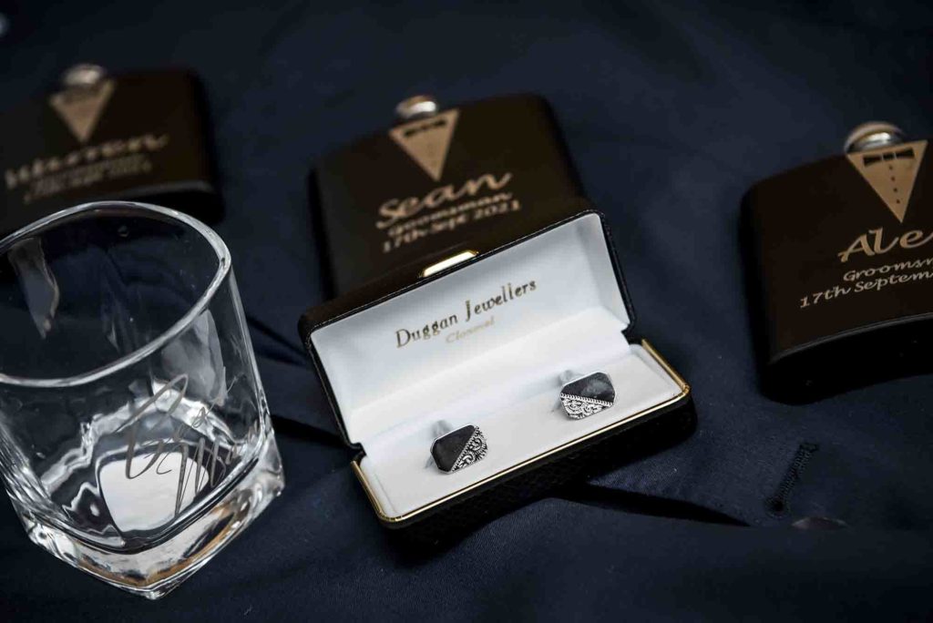 Champagne tower pouring bubbly at the newlyweds' glamorous reception.