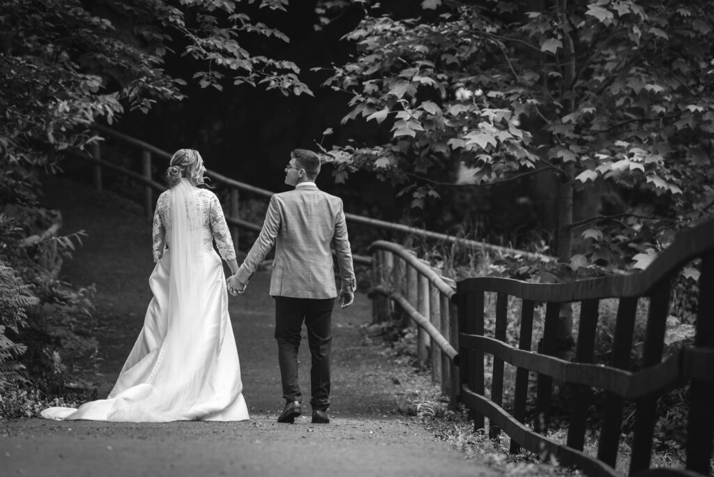 Capturing the essence of togetherness – bride and groom walking as one in Cahir