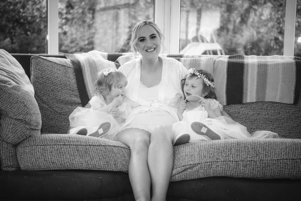 Charming scene of the bride and flowergirls, picture-perfect