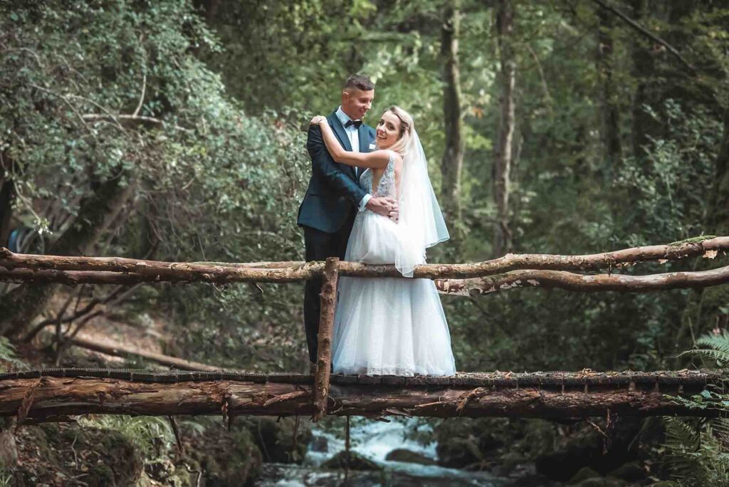 Bride and groom stealing a quiet moment on a vintage swing at the venue.